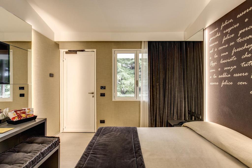 Postel nebo postele na pokoji v ubytování Motel Rona