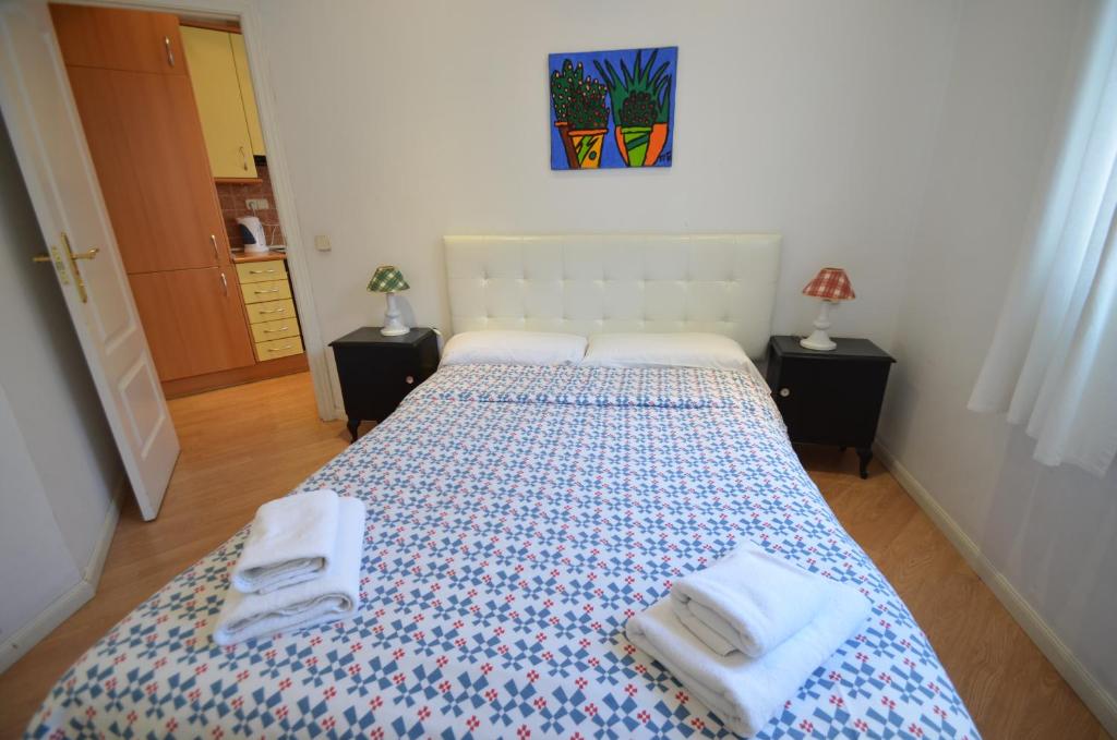 Postel nebo postele na pokoji v ubytování StopinFlat