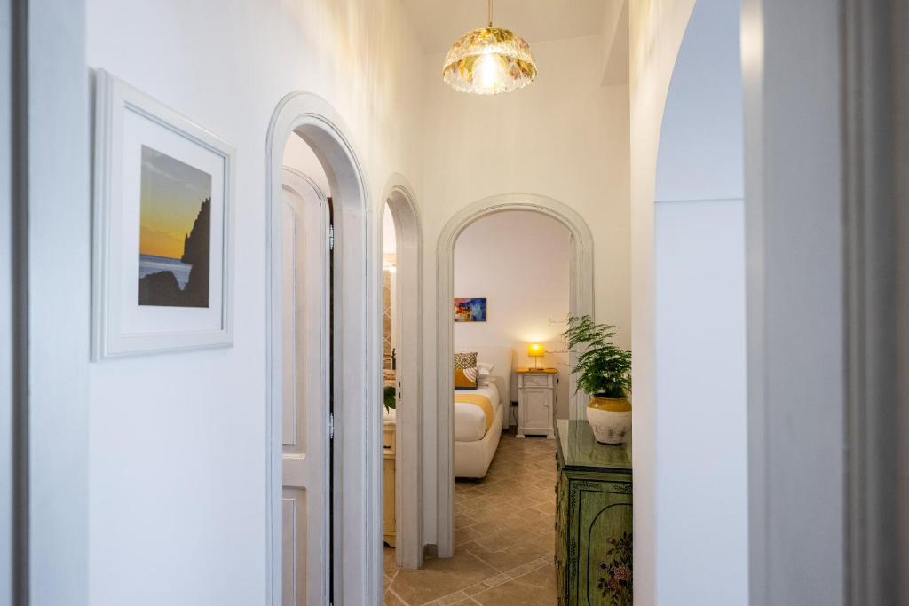 Postel nebo postele na pokoji v ubytování Casa Giulia Positano