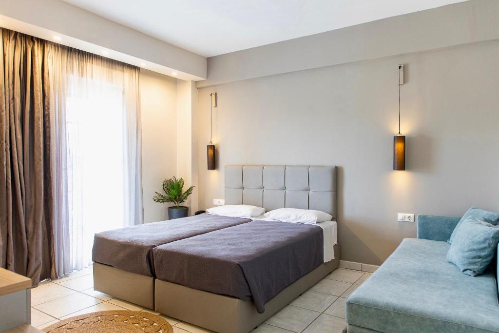 Postel nebo postele na pokoji v ubytování Anais Hotel