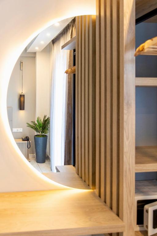 Postel nebo postele na pokoji v ubytování Anais Hotel