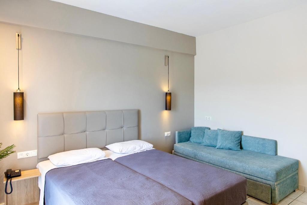 Postel nebo postele na pokoji v ubytování Anais Hotel