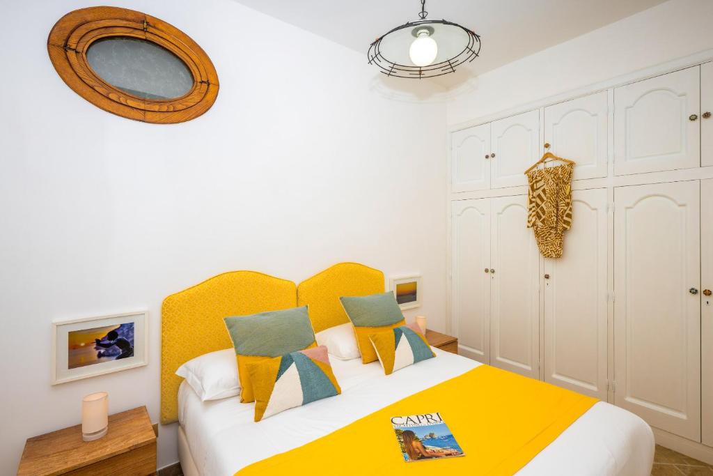 Postel nebo postele na pokoji v ubytování Casa Giulia Positano