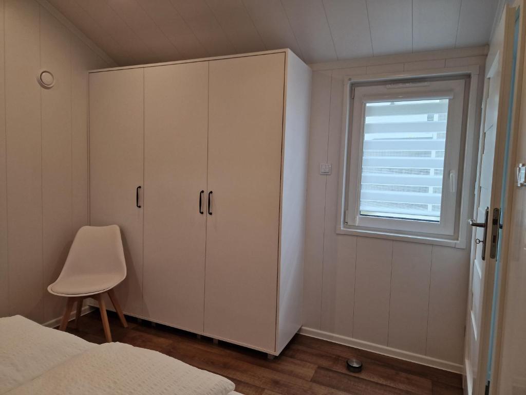Postel nebo postele na pokoji v ubytování Tiny House in schöner Lage