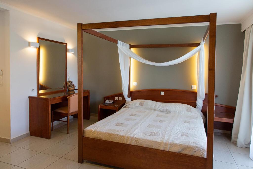 Postel nebo postele na pokoji v ubytování Anais Hotel
