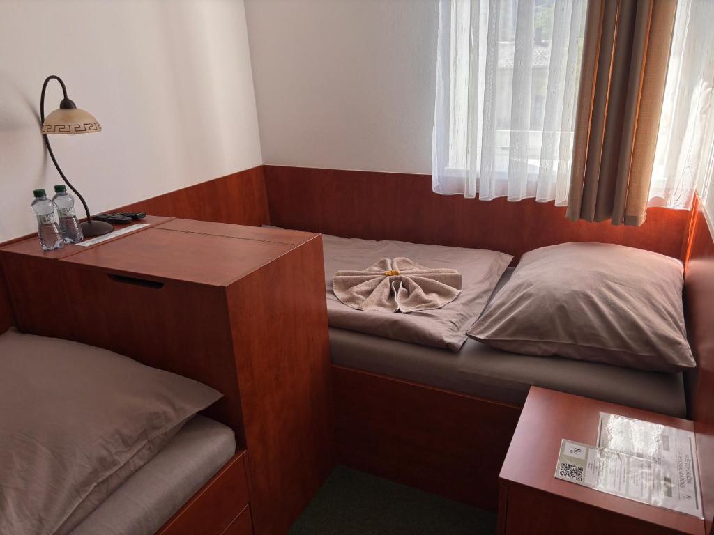 Postel nebo postele na pokoji v ubytování Ubytování Jívka 86