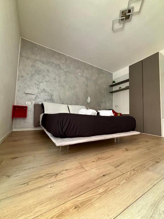 Posteľ alebo postele v izbe v ubytovaní san rocco apartments