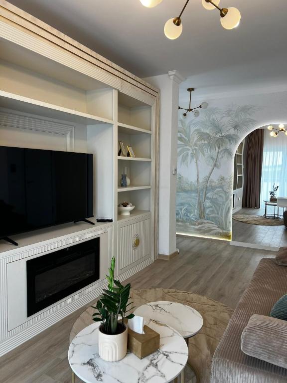 TV a/nebo společenská místnost v ubytování Bridge Penthouse