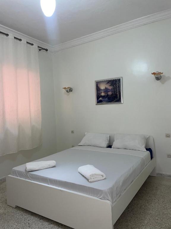 Postel nebo postele na pokoji v ubytování Hotel Maison Olga