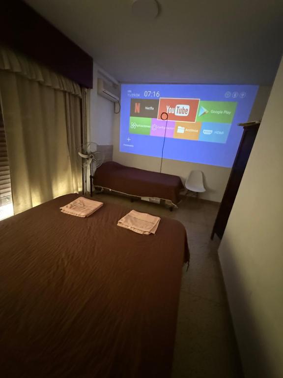 Postel nebo postele na pokoji v ubytování Hostel Vicente