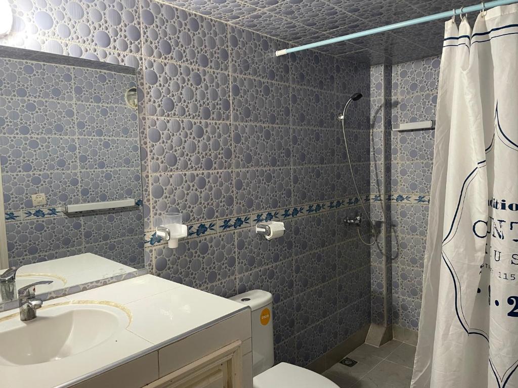 Koupelna v ubytování Hotel Maison Olga