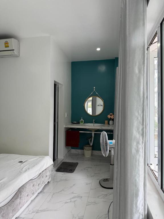 Postel nebo postele na pokoji v ubytování Cat Ba Santorini Homestay