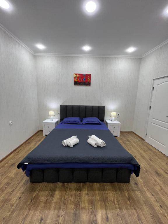 Postel nebo postele na pokoji v ubytování Home in Tiflis