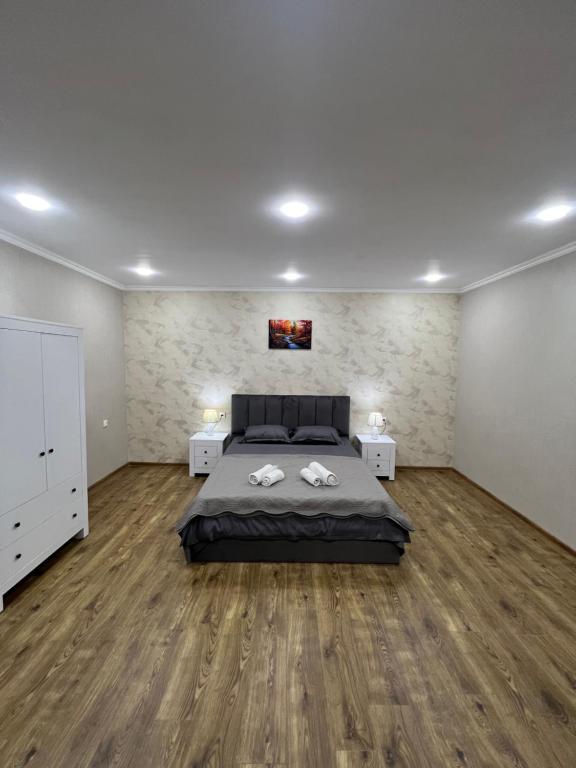 Postel nebo postele na pokoji v ubytování Home in Tiflis