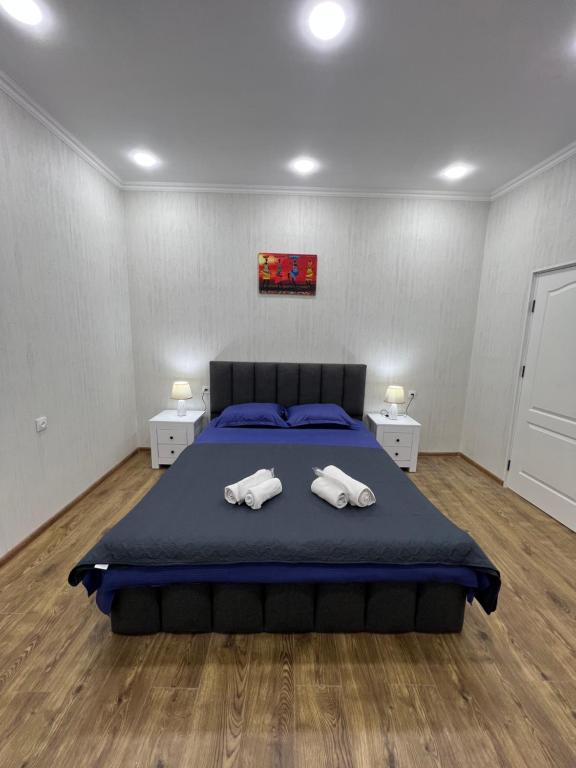 Postel nebo postele na pokoji v ubytování Home in Tiflis
