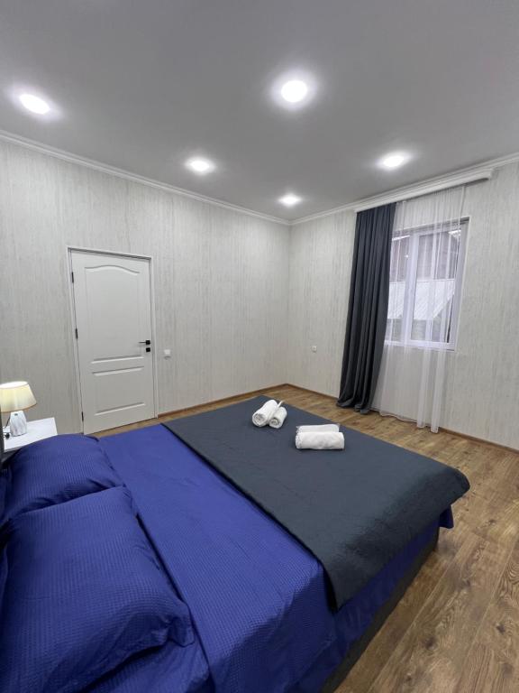 Postel nebo postele na pokoji v ubytování Home in Tiflis