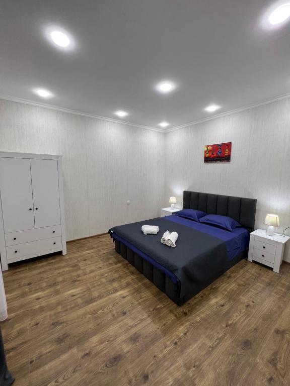 Postel nebo postele na pokoji v ubytování Home in Tiflis
