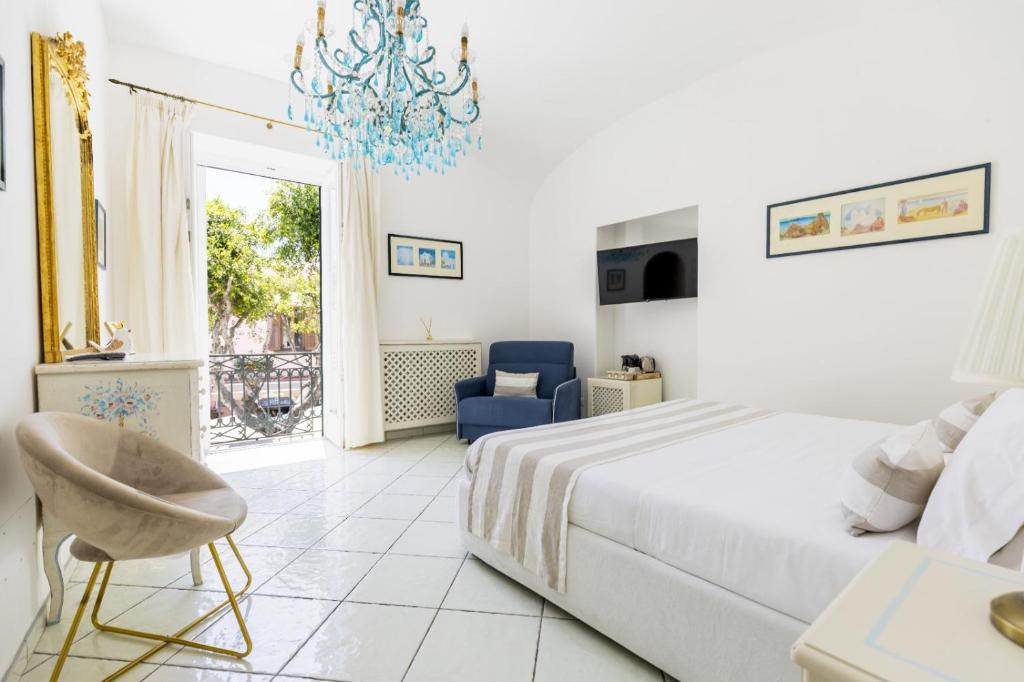 Ένα ή περισσότερα κρεβάτια σε δωμάτιο στο Queen Suite - Luxury Rooms