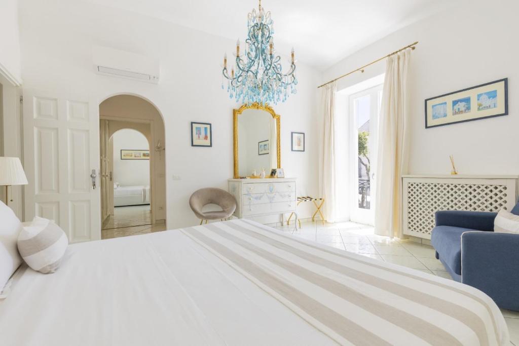 Ένα ή περισσότερα κρεβάτια σε δωμάτιο στο Queen Suite - Luxury Rooms