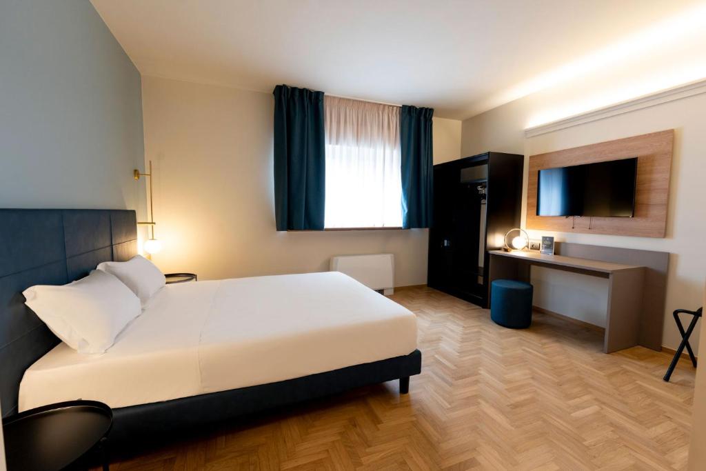 Postel nebo postele na pokoji v ubytování Cristal Palace Hotel