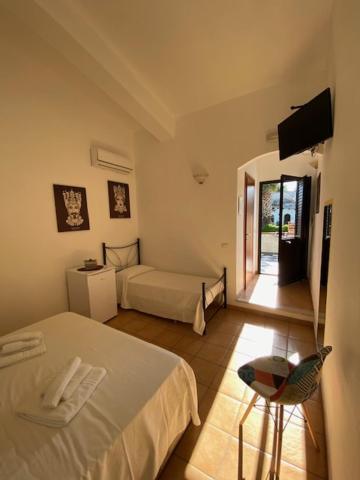 Postel nebo postele na pokoji v ubytování B&B Quattromulini !!