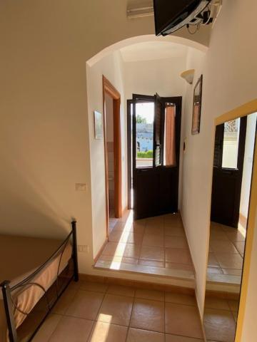 TV a/nebo společenská místnost v ubytování B&B Quattromulini !!