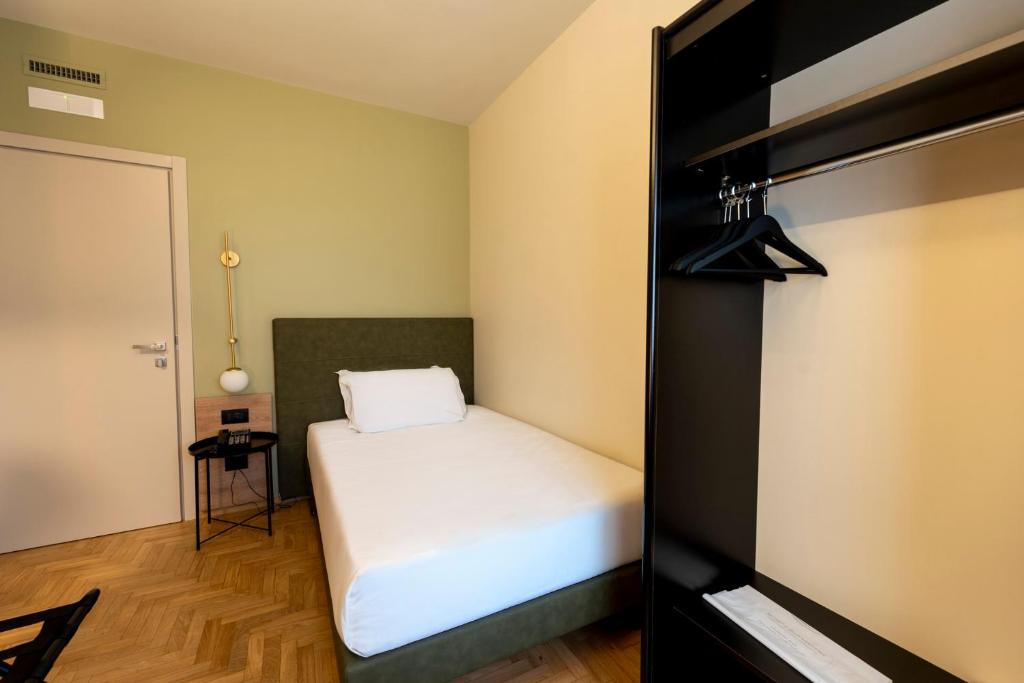 Postel nebo postele na pokoji v ubytování Cristal Palace Hotel