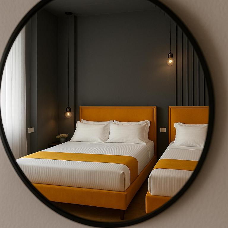 Una cama o camas en una habitación de NEW - Colorful by the sea