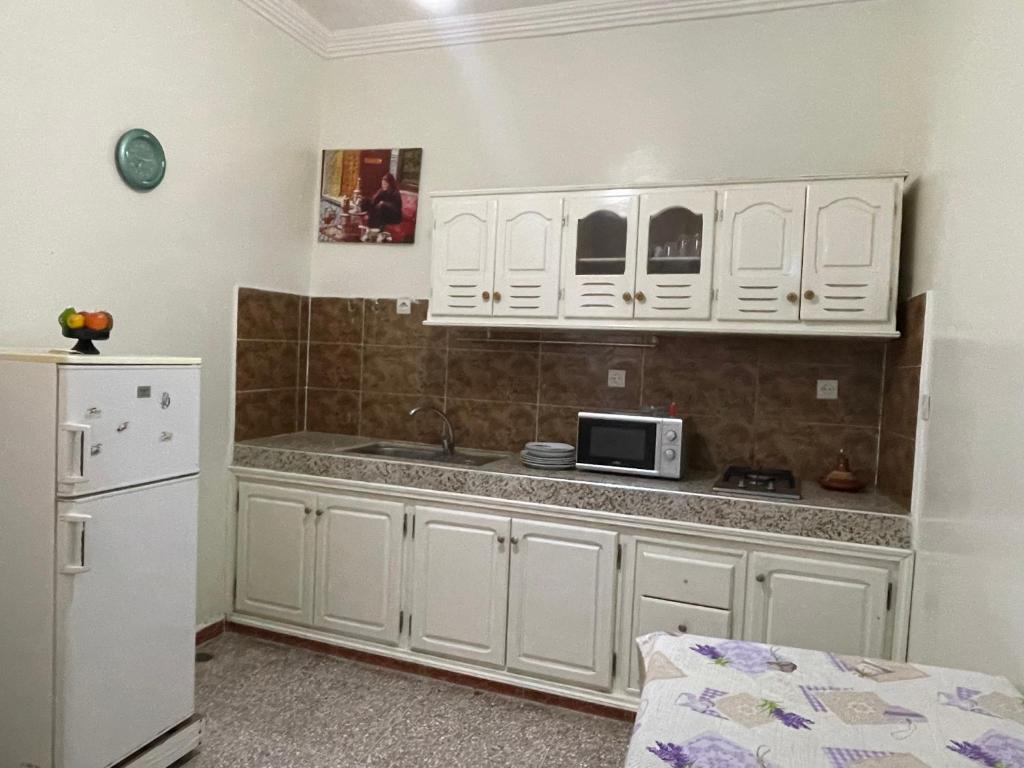 Kuchyň nebo kuchyňský kout v ubytování Hotel Maison Olga