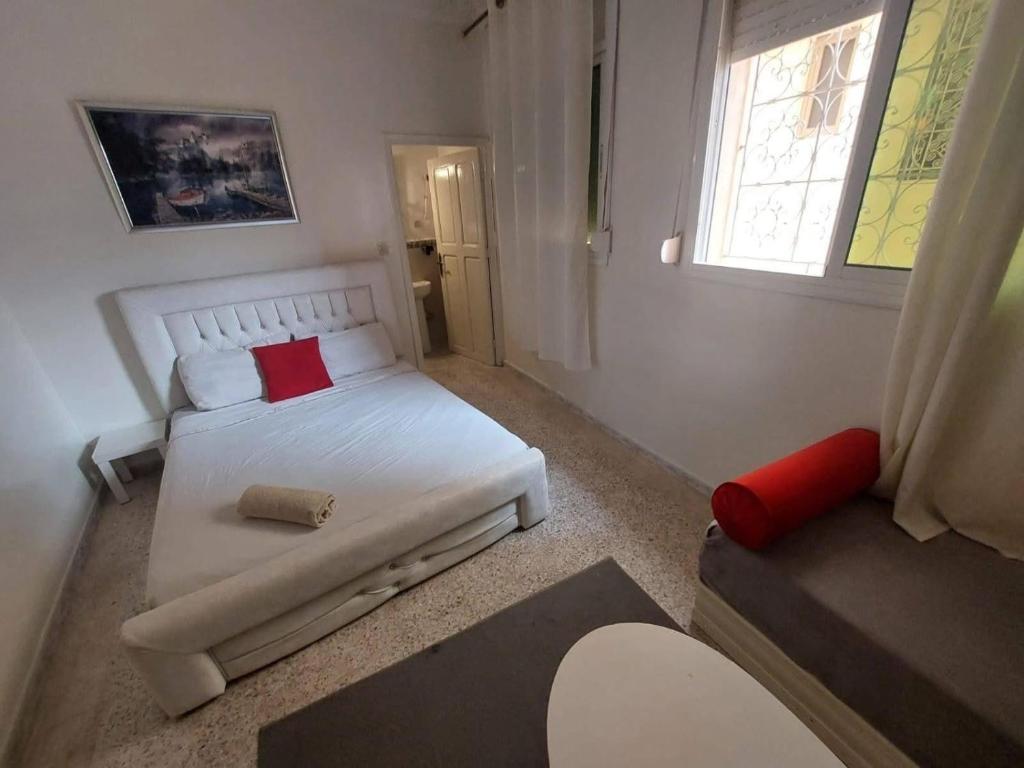 Postel nebo postele na pokoji v ubytování Hotel Maison Olga