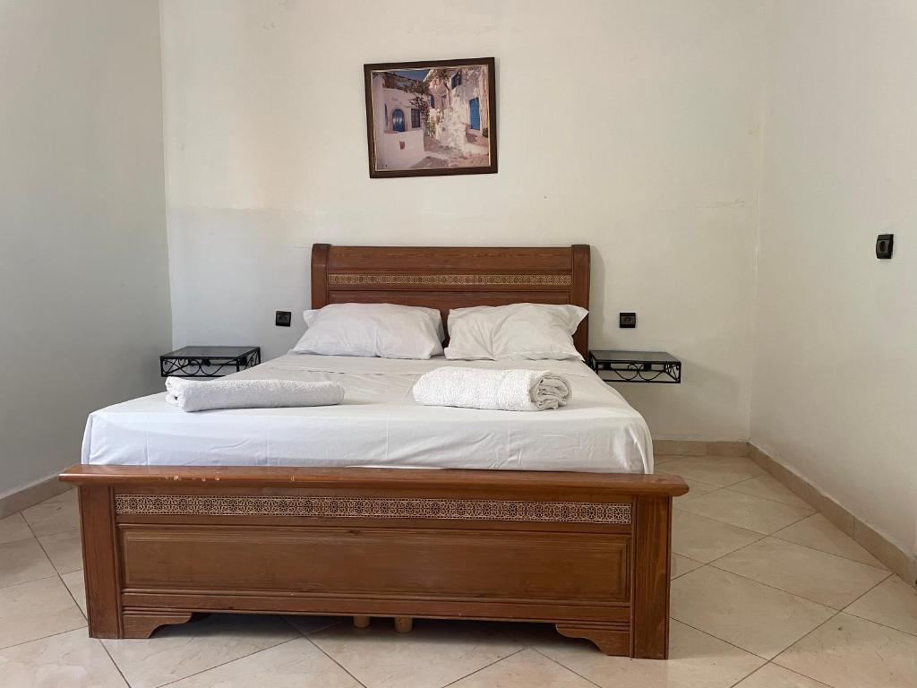 Postel nebo postele na pokoji v ubytování Hotel Maison Olga