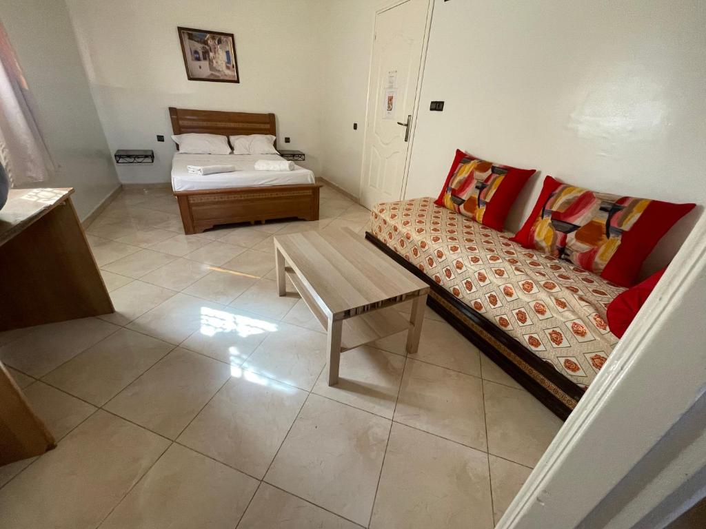 Postel nebo postele na pokoji v ubytování Hotel Maison Olga