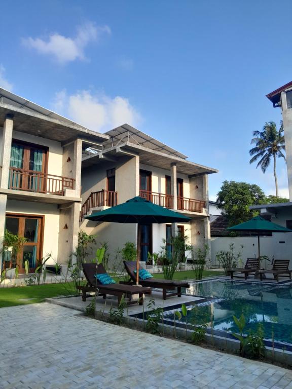 Bazén v ubytování Beach Inns Residences nebo v jeho okolí