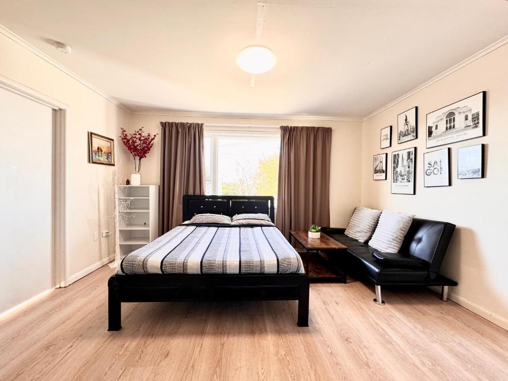 Postel nebo postele na pokoji v ubytování PRIVATE ROOMS IN CENTRAL AUCKLAND