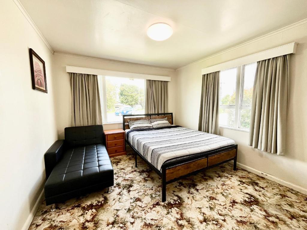 Postel nebo postele na pokoji v ubytování PRIVATE ROOMS IN CENTRAL AUCKLAND