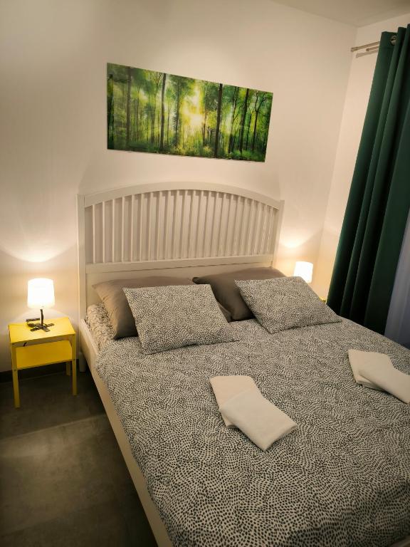 Postel nebo postele na pokoji v ubytování Pod Kovárnou