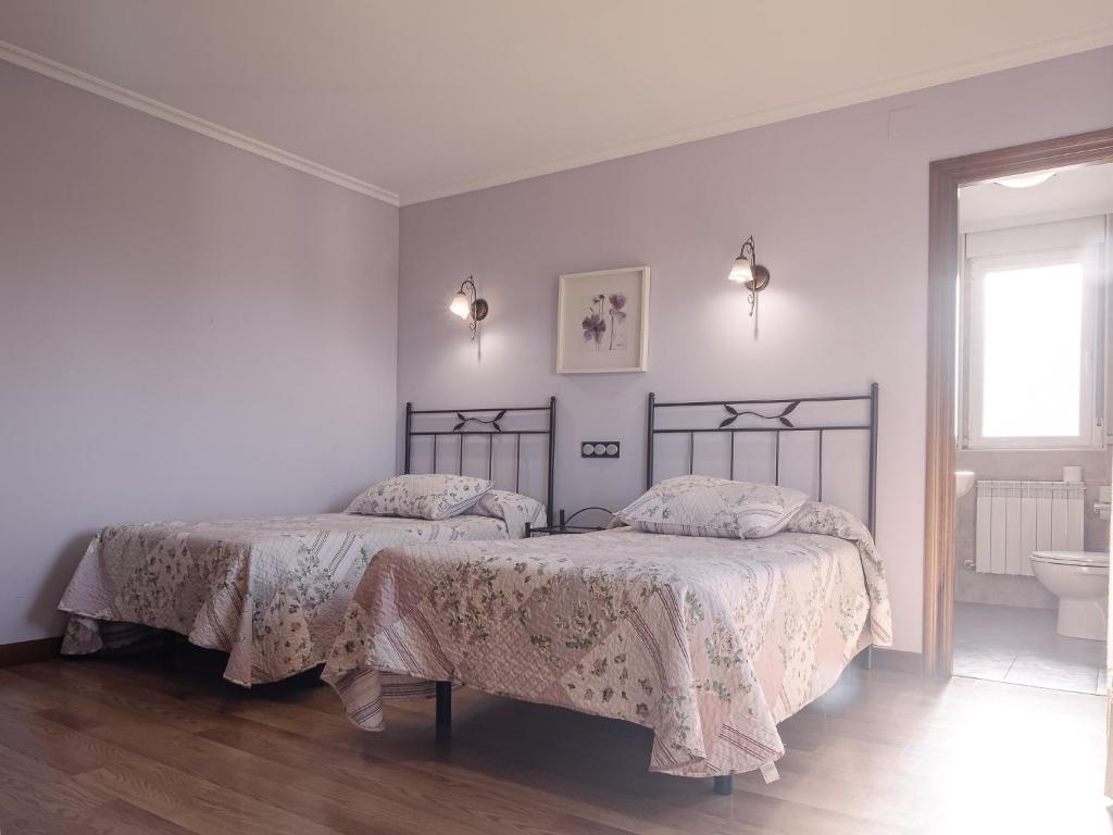 Posteľ alebo postele v izbe v ubytovaní Casa rural Ermita 1 y 2