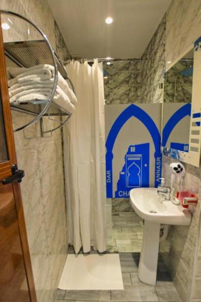Koupelna v ubytování Hotel Dar Annasr