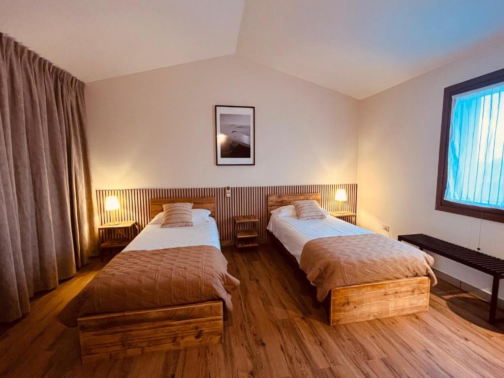 Postel nebo postele na pokoji v ubytování Tilly's Locanda