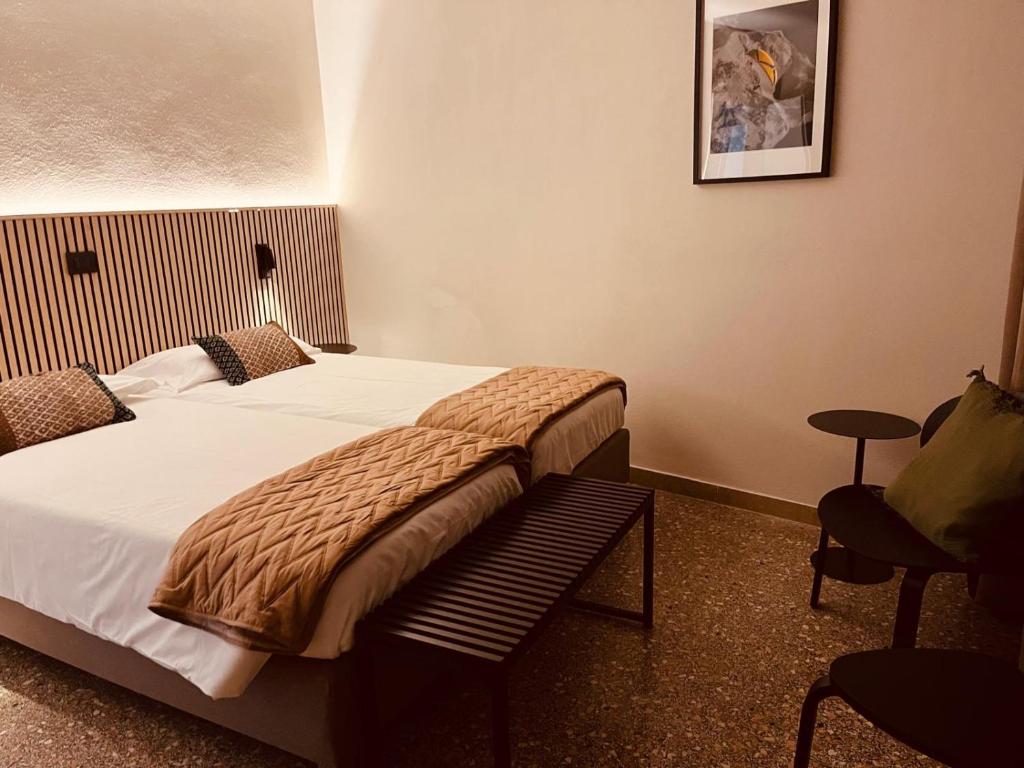 Postel nebo postele na pokoji v ubytování Tilly's Locanda