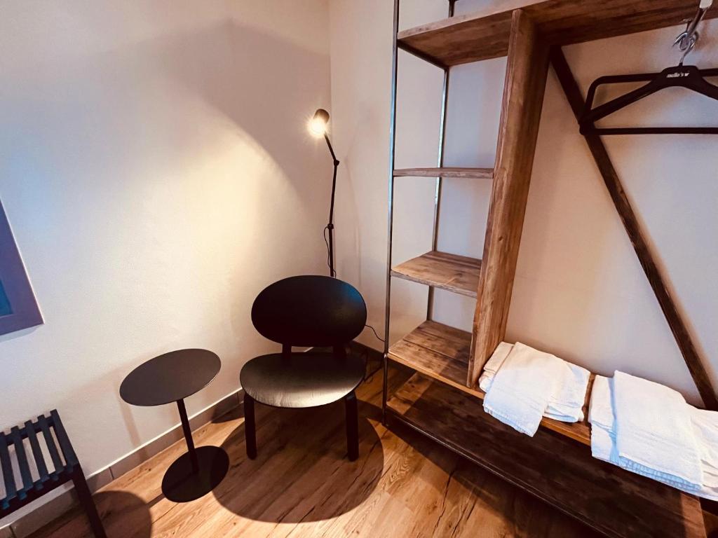 Postel nebo postele na pokoji v ubytování Tilly's Locanda