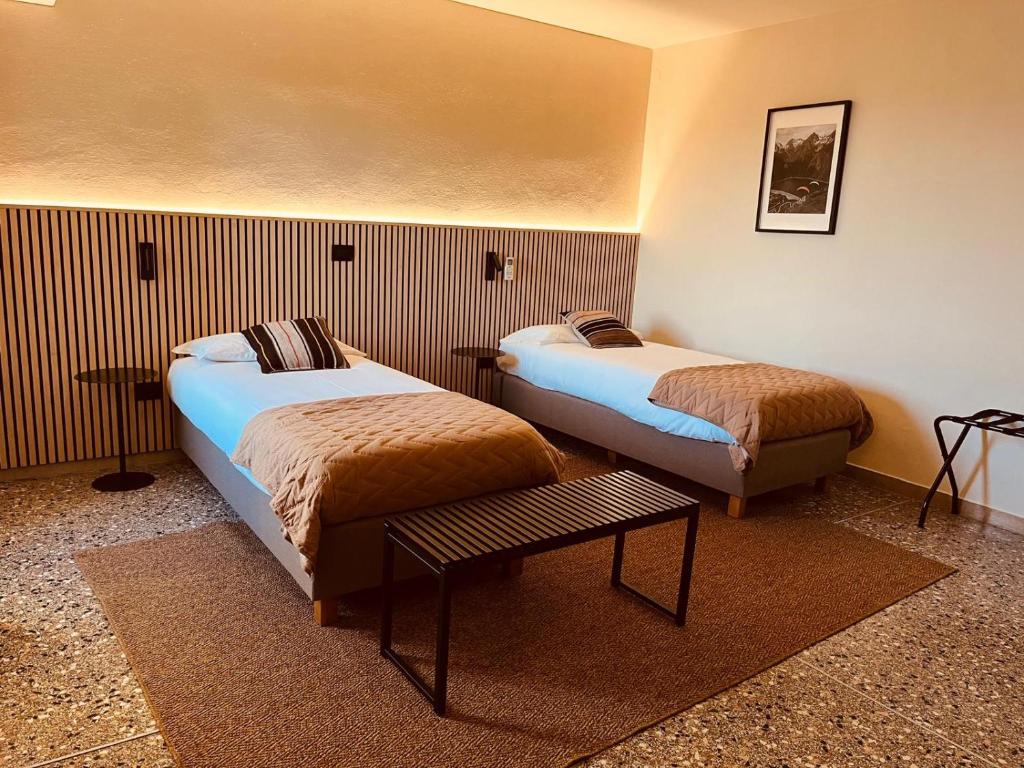 Postel nebo postele na pokoji v ubytování Tilly's Locanda