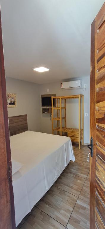 Postel nebo postele na pokoji v ubytování Pousada Delicia De Sono