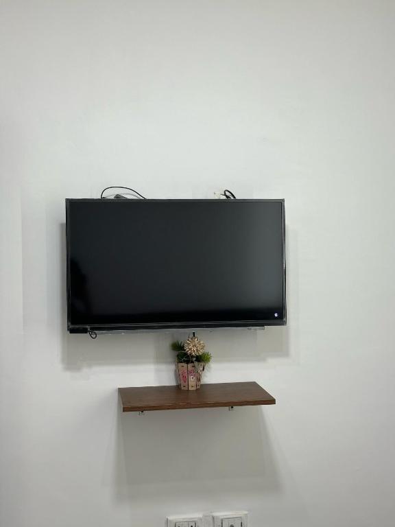 TV a/nebo společenská místnost v ubytování Pyramids Home Guest House
