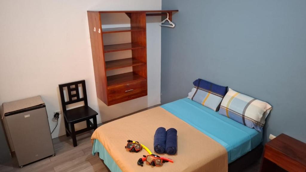Postel nebo postele na pokoji v ubytování Casa Alexita