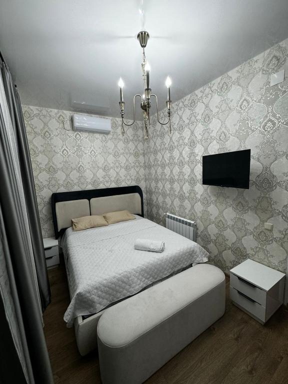 Postel nebo postele na pokoji v ubytování Kobuleti Guest House