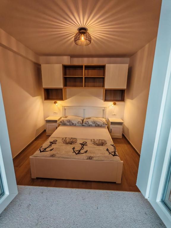 Posteľ alebo postele v izbe v ubytovaní Apartments Amfora