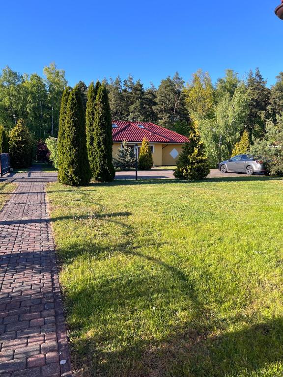 Vonkajšia záhrada v ubytovaní Apartamenty Amber Wyspa