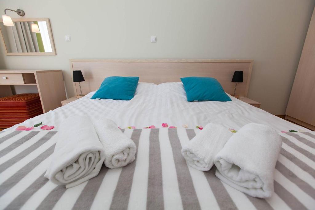 Posteľ alebo postele v izbe v ubytovaní Apartments Ines