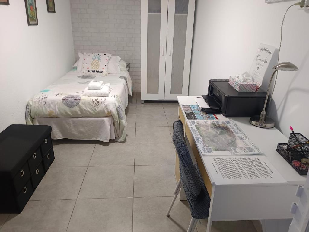 A bed or beds in a room at Casa Fortu La Palma